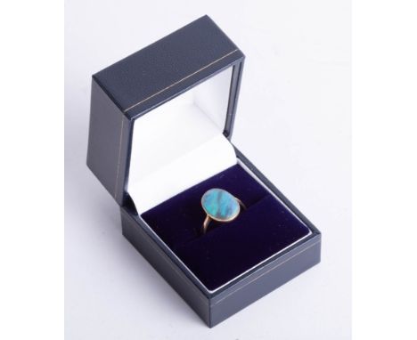 An opal set ring, size 13mm x 11mm, size L.