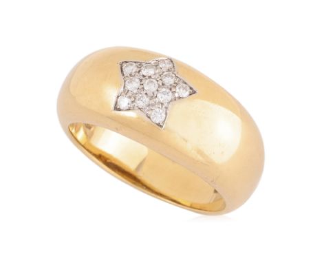 AN ITALIAN DIAMOND 'STAR' RING
Featuring round brilliant cut diamonds totalling approximately 0.11 Cts, mounted in a yellow g
