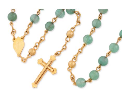 A CROSS PENDANT ON A GREEN BEAD CHAIN
Featuring a cross pendant marked '916' for 22K, on a yellow metal chain with green bead
