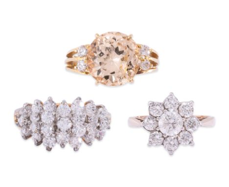 A GROUP OF RINGS (3)
To include a yellow spodumene and CZ ring, mounted in a yellow gold setting marked '750' for 18K, a CZ '
