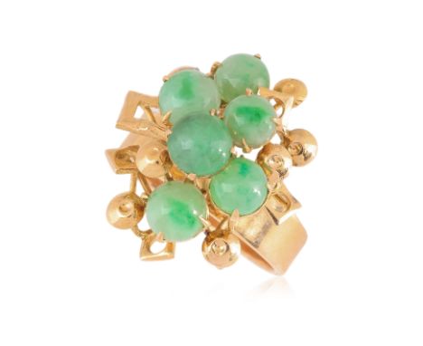 A JADE CLUSTER RING
Featuring jade pieces mounted in a high karat yellow gold setting marked '22K'.
US Size 4.5
6.0g
Ownershi