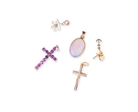 A GROUP OF PENDANTS (5)
To include a Star of David pendant, marked '14K', accented with a round cut emerald, a cross pendant 