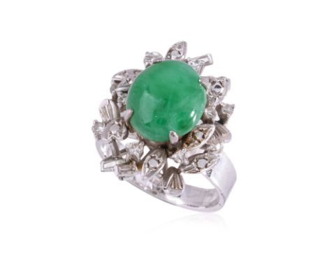 A JADEITE AND DIAMOND RING
Featuring a jadeite cabochon mounted in a white gold setting marked '18K', accented with round cut
