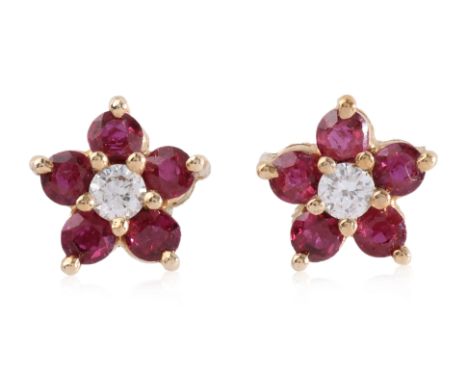 A PAIR OF RUBY AND DIAMOND 'FLOWER CLUSTER' STUD EARRINGS
Featuring round brilliant cuts totalling approximately 0.10 Cts, mo