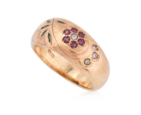 A RUBY, EMERALD AND DIAMOND RING
Featuring round cut rubies totalling approximately 0.18 Cts, mounted in a yellow gold settin