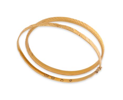 TWO HIGH KARAT GOLD BANGLES
Featuring two bangles, mounted in high karat yellow gold settings with various marks, including '