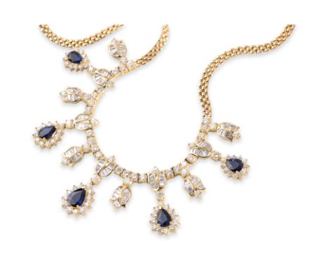 A BLUE SAPPHIRE AND DIAMOND NECKLACE
Featuring pear shaped blue sapphires totalling approximately 6.24 Cts, mounted in a yell