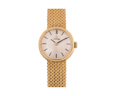 AN OMEGA LADY'S GOLD BRACELET WATCH
Ref. 7173, Case No. A21397,
18K gold case and integral bracelet strap, silvered dial with