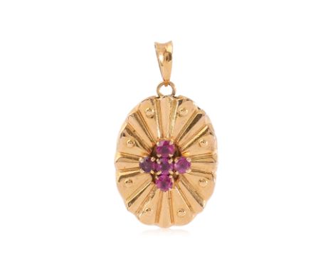 A RUBY PENDANT
Featuring round cut rubies totalling approximately 0.40 Cts, mounted in a yellow gold setting marked '14K'.
2.