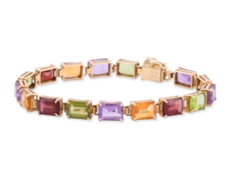 A MULTI-GEM BRACELET
Featuring garnets, peridots, amethysts and citrines totalling approximately 28.0 Cts, mounted in a yello