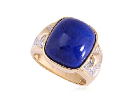 A LAPIS LAZULI AND DIAMOND RING
Featuring a lapis lazuli cabochon mounted in a two tone gold setting marked '750' for 18K, al