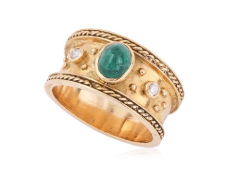 AN EMERALD AND DIAMOND RING
Featuring an emerald cabochon weighing approximately 0.70 Cts, mounted in a yellow gold setting w