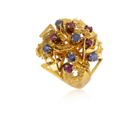 A RUBY AND SAPPHIRE RING
Featuring round cut rubies and sapphire totalling approximately 0.90 Cts, mounted in a yellow gold s