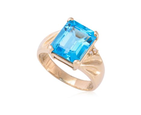 A BLUE TOPAZ AND DIAMOND RING
Featuring a blue topaz weighing approximately 5.0 Cts, mounted in a yellow gold setting marked 
