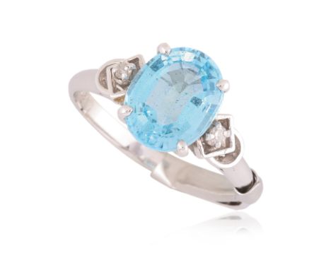 A TOPAZ AND DIAMOND RING
Featuring a blue topaz weighing approximately 2.36 Cts (marked), mounted in a white gold setting mar