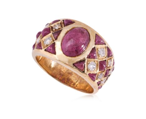 A RUBY AND DIAMOND RING
Featuring a cabochon ruby weighing approximately 2.00 Cts, mounted in a yellow gold setting marked '7