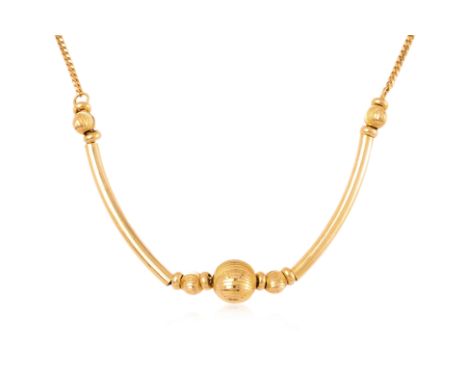 A GOLD NECKLACE
Featuring a gold necklace with textured beads, mounted in an unmarked yellow gold setting, likely high karat.