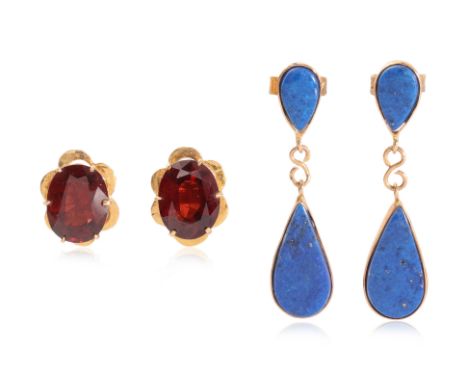 TWO PAIRS OF EARRINGS
To include a pair of garnet screw-on stud earrings featuring oval garnets totalling approximately 4.00 