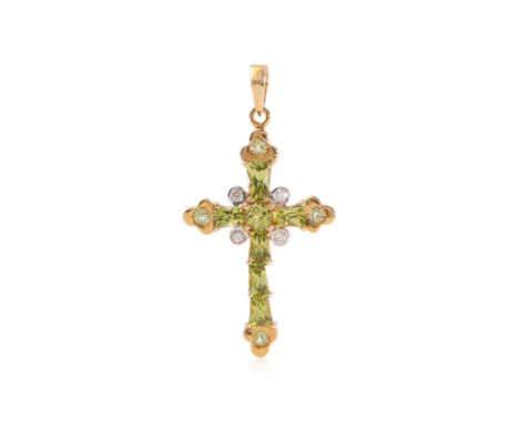 A PERIDOT AND DIAMOND 'CROSS' PENDANT
Featuring round and trapezium shaped peridots totalling approximately 2.00 Cts, mounted