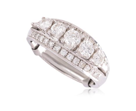 A THREE ROW DIAMOND RING
Featuring five round brilliant cut diamonds totalling approximately 0.60 Cts, mounted in a white gol