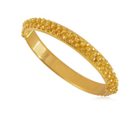 A HIGH KARAT GOLD BANGLE
Featuring a high karat gold bangle marked '916' for 22K, alongside various other marks.
Inner measur