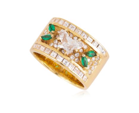 A 'BUTTERFLY' DIAMOND AND EMERALD RING
Featuring a 'butterfly' fancy cut diamond weighing approximately 0.45 Cts, mounted in 
