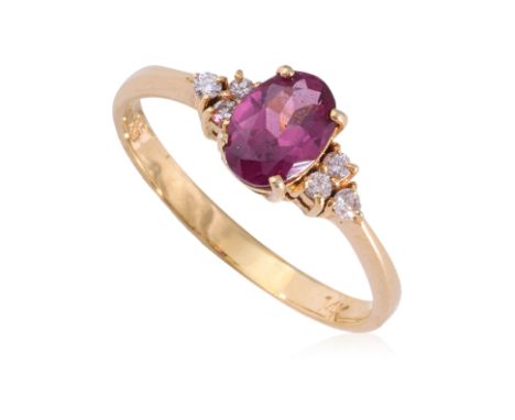 A GARNET AND DIAMOND RING
Featuring a purple garnet weighing approximately 0.9 Cts, mounted in a yellow gold setting marked '