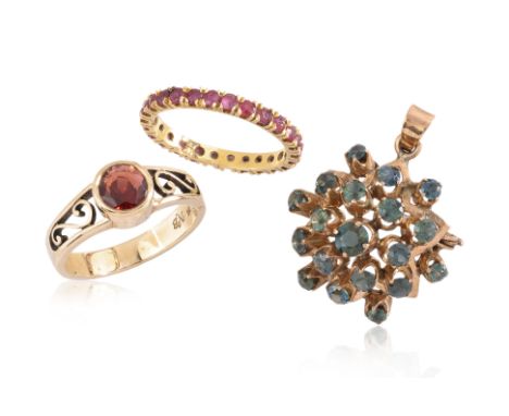 A GROUP OF JEWELLERY (3)
To include a garnet set ring, marked '375' for 9K, a ruby set eternity band, marked '585' for 14K, a