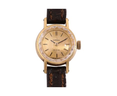 AN OMEGA DE VILLE LADY'S GOLD WATCH
Ref. 511227, Circa 1960s, 
18K gold case, gilt dial with baton hour markers, manual wind 
