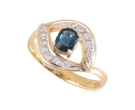 A SAPPHIRE AND DIAMOND RING
Featuring a cushion cut sapphire weighing approximately 0.50 Cts, mounted in a two tone gold sett
