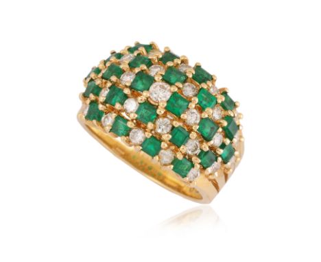 AN EMERALD AND DIAMOND 'BOMBE' RING
Featuring square cut emerald weighing approximately 1.79 Cts (marked), mounted in a yello
