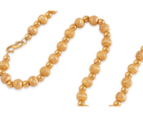 A HIGH KARAT GOLD BEADS NECKLACE
Featuring a high karat gold beads necklace indistinctly marked '916' for 22K to the clasp.
4