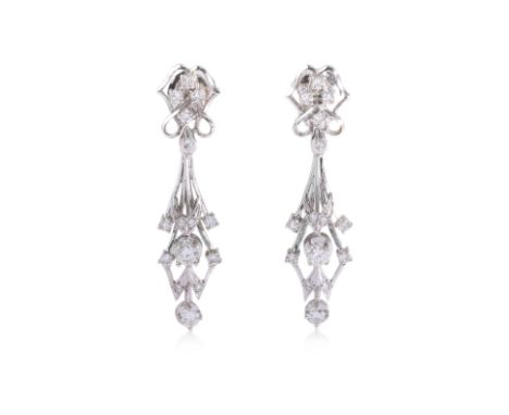 A PAIR OF DIAMOND SCREW-ON EARRINGS
Featuring round brilliant cut diamonds totalling approximately 0.50 Cts, mounted in a whi
