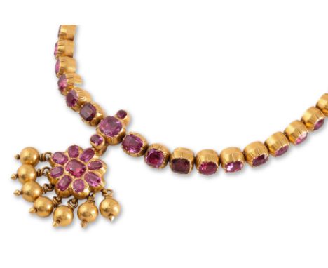 A RUBY CHOKER Featuring cushion cut rubies, likely all foil backed, initial testing revealed approximately 5 are synthetics, 