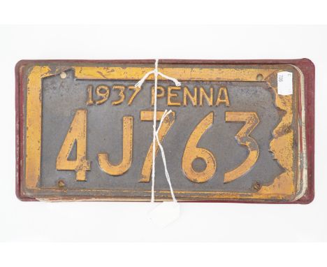 Vintage US tinplate car registration plates