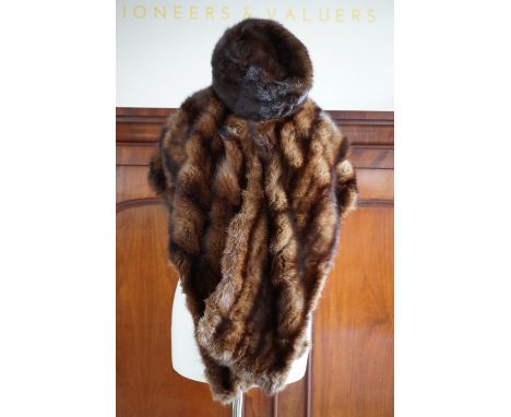 A vintage fur stole by Stosfky of Madison Avenue, New York, together with other furs stoles / collars and two fur hats