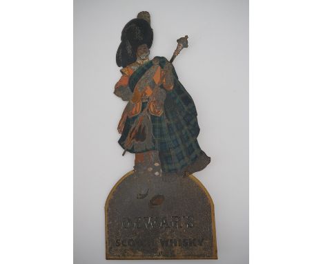 A Dewars scotch whisky advertising sign, 26cm high.