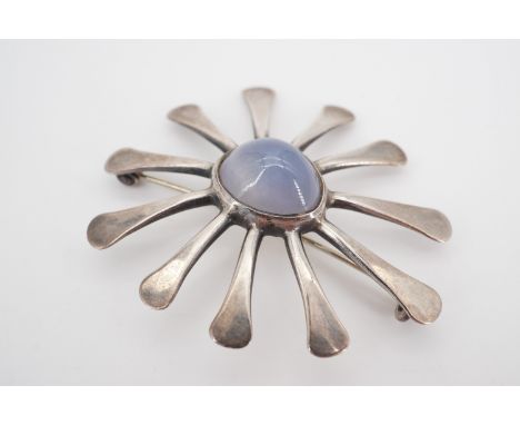 A vintage silver and moonstone brooch, of organic form, Edinburgh, 1978, 5 cm, 8.5g
