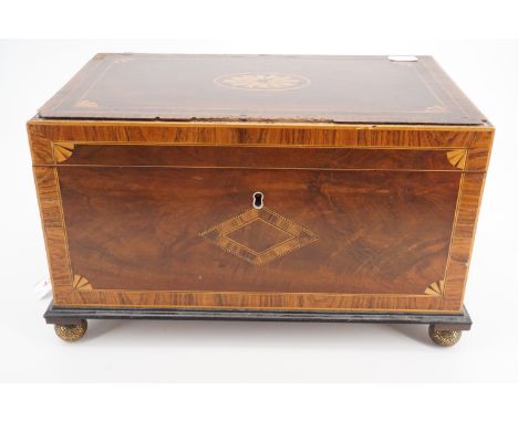 A George III marquetry-inlaid mahogany tea caddy, 33 cm wide.