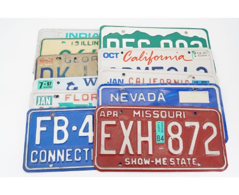 Vintage US tinplate car registration plates