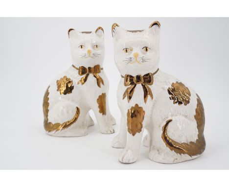 A pair of Staffordshire style ceramic cats, 20 cm