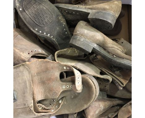 A large number of WWII US Army field boots (miss-matched)