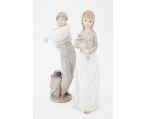 Two Nao figurines: a Spanish dancer (a/f) and girl with bouquet