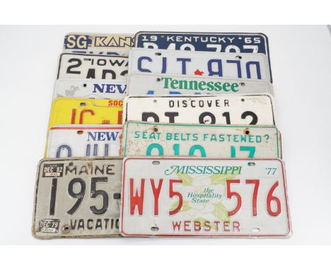 Vintage US tinplate car registration plates