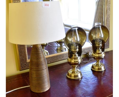 PAIR OF BEDSIDE LAMPS IN THE FORM OF EARLY CAR LAMPS, AND ANOTHER TABLE LAMP