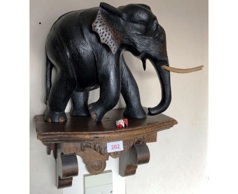 CARVED WOODEN ELEPHANT AND WALL BRACKET