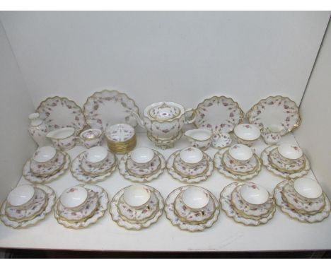 An extensive set of Royal Crown Derby Royal Antoinette pattern tea and tableware, comprising of a teapot, three cake plates, 