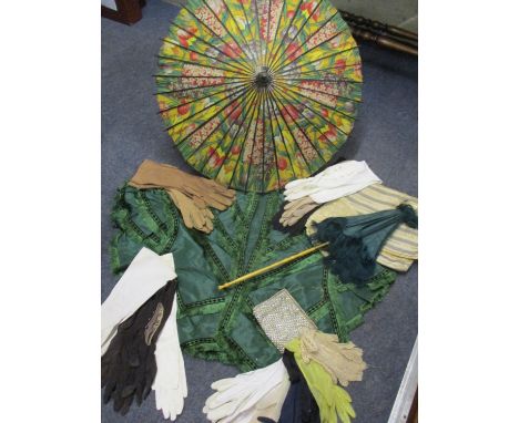 Two mid 20th century oriental style parasols depicting tulips, together with an early 20th century green taffeta cape with gr