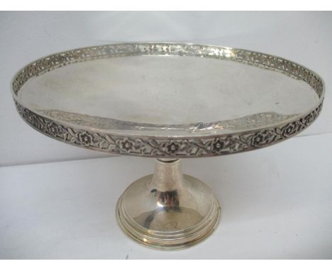 A George V silver pedestal dish by T Wilkinson &amp; Son Birmingham 1925, with a cast, pierced flower and leaf border, on a s