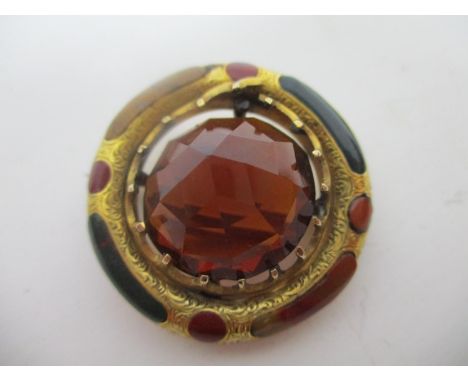 A yellow coloured metal plaid brooch set with a smokey quartz, within an engraved ring set with panels of agate, 9.9g, total 